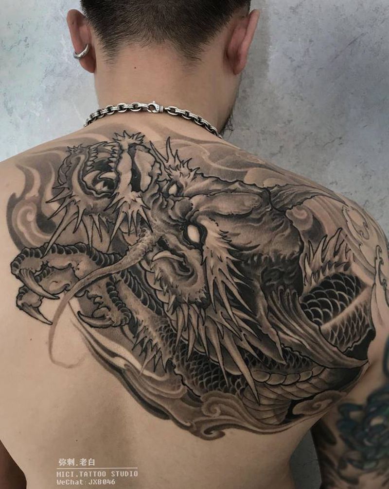 龙头纹身图片_背部肩部新传统龙纹身图案