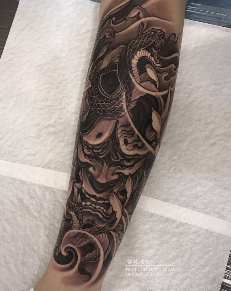 般若纹身图片_腿部新传统般若蛇纹身图案