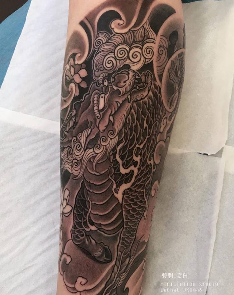 麒麟纹身图片_腿部老传统麒麟纹身图案