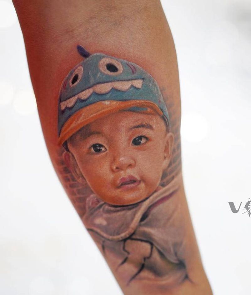 肖像作品纹身图片_手臂欧美写实肖像照片写实纹身图案