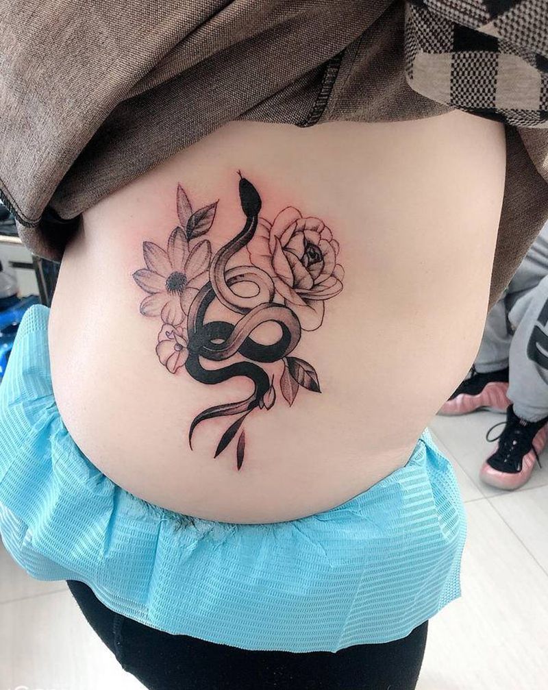 遮盖胎记纹身图片_腰部点刺纹身图案