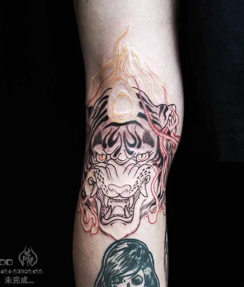 虎头纹身图片_腿部新传统虎头纹身图案