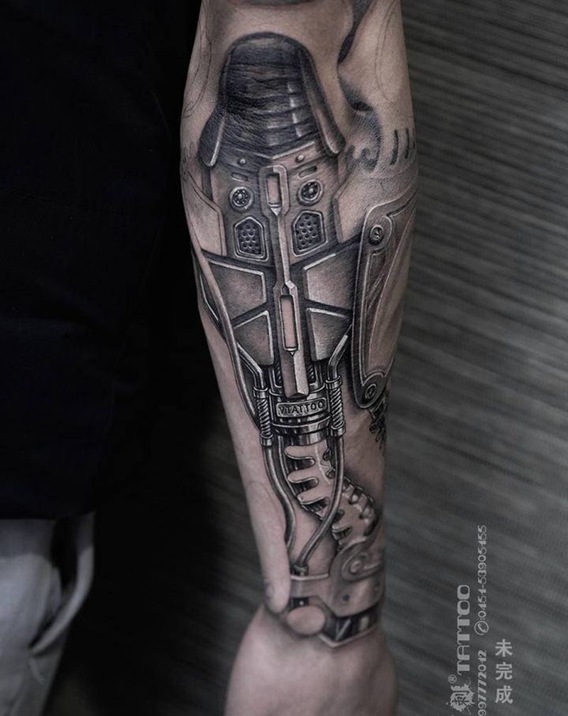 机械构造爱好者纹身图片_手臂欧美写实机械机械哈尔滨纹身图案