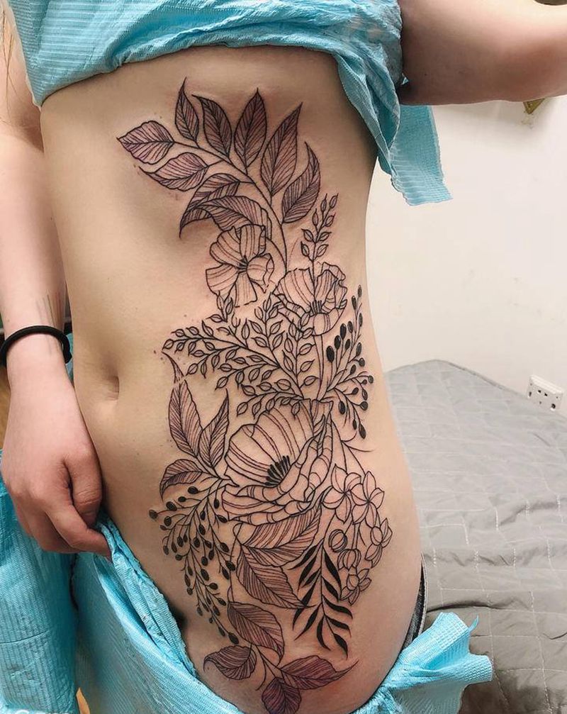 素花纹身图片_腰部素花纹身图案