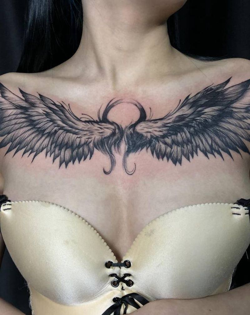 遮盖翅膀纹身图片_胸部纹身图案
