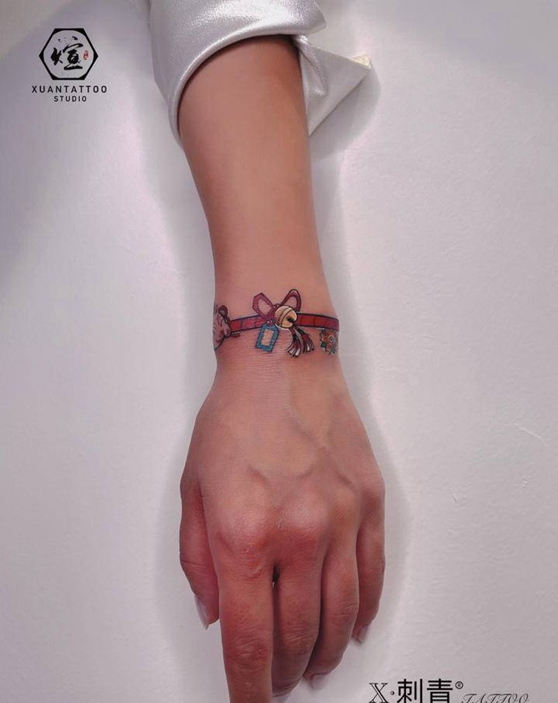 日式小手环纹身图片_手臂臂环日式小清新铃铛纹身图案