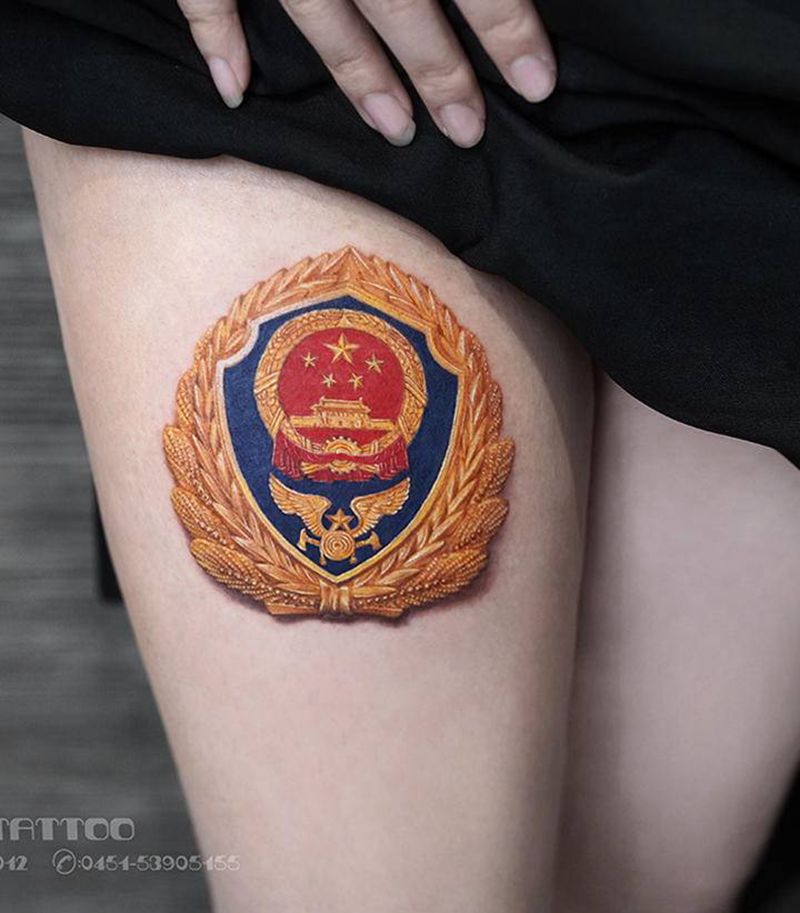 还记得那些曾经帮助过你的人吗纹身图片_腿部欧美写实消防队徽徽章写实纹身图案