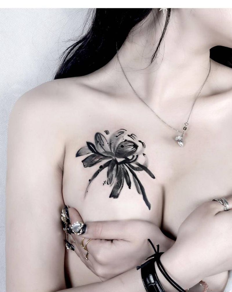 水墨莲花纹身图片_胸部水墨水彩纹身图案