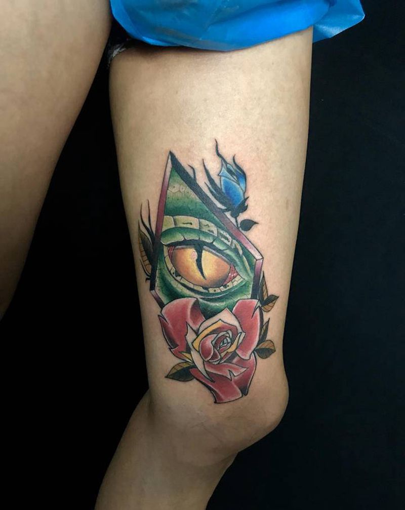 鳄鱼得眼纹身图片_腿部New School纹身图案