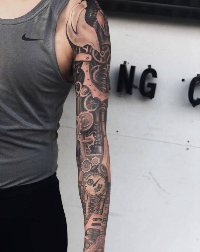 机械臂纹身图片_手臂欧美写实机械花臂机械花臂纹身图案