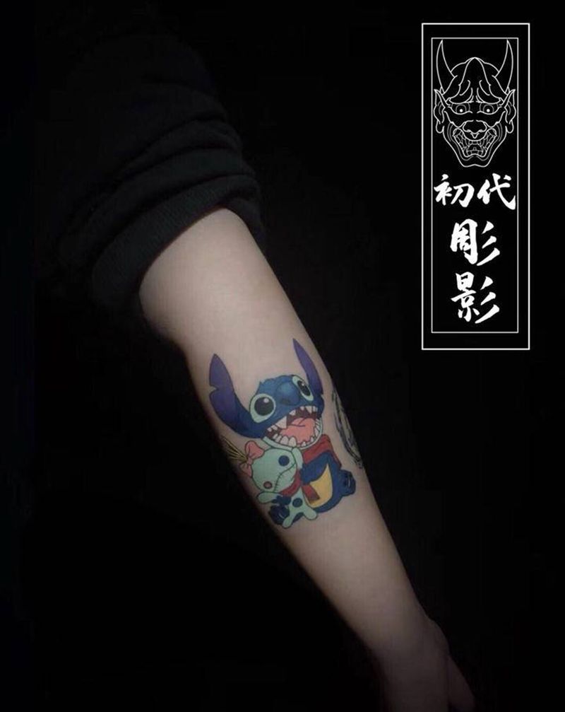 史迪仔纹身图片_手臂New School卡通纹身图案