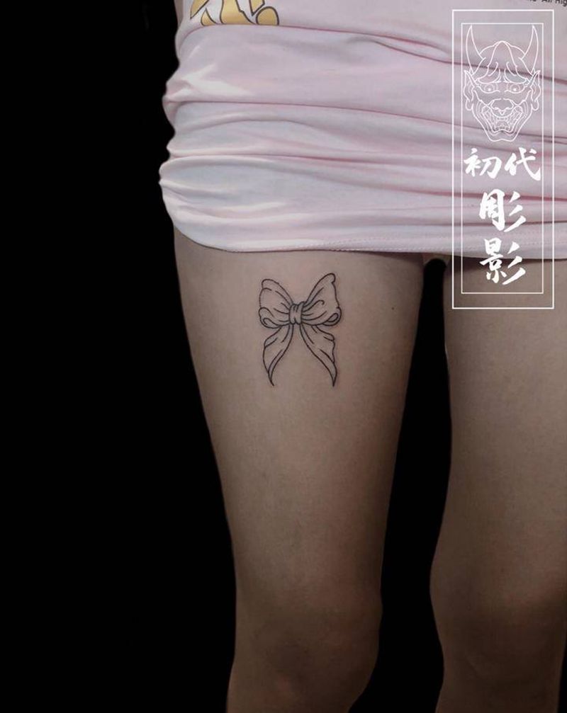 蝴蝶结纹身图片_腿部点刺蝴蝶结小清新纹身图案