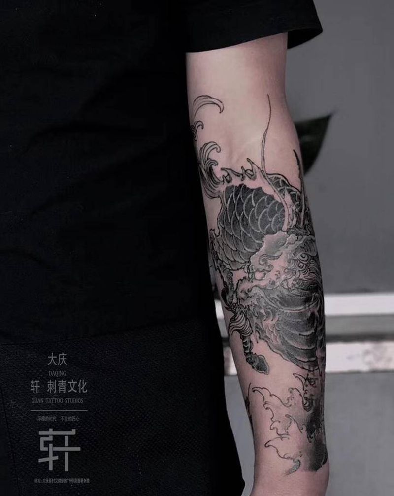 麒麟遮盖纹身图片_手臂新传统纹身图案