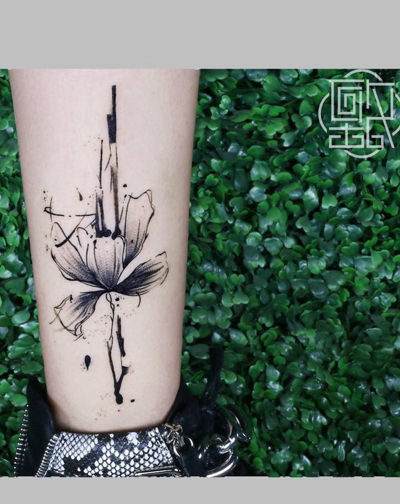 素花纹身图片_腿部点刺几何花纹身图案