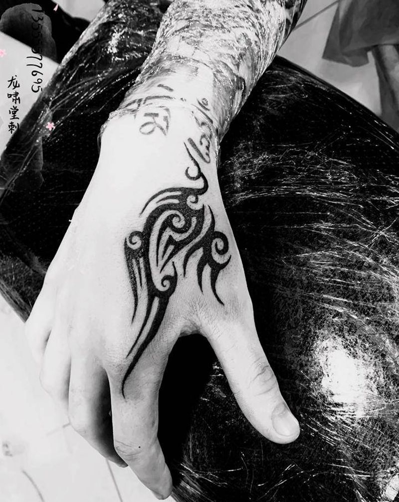 虎口图腾纹身图片_手臂图腾纹身图案