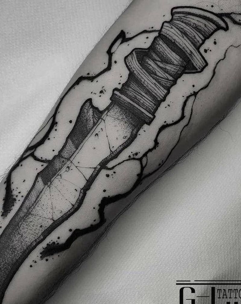 匕首纹身图片_手臂点刺纹身图案