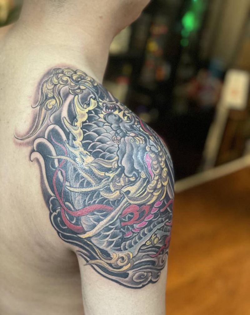 麒麟纹身图片_手臂新传统纹身图案