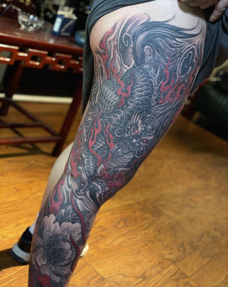 麒麟牡丹纹身图片_腿部新传统纹身图案