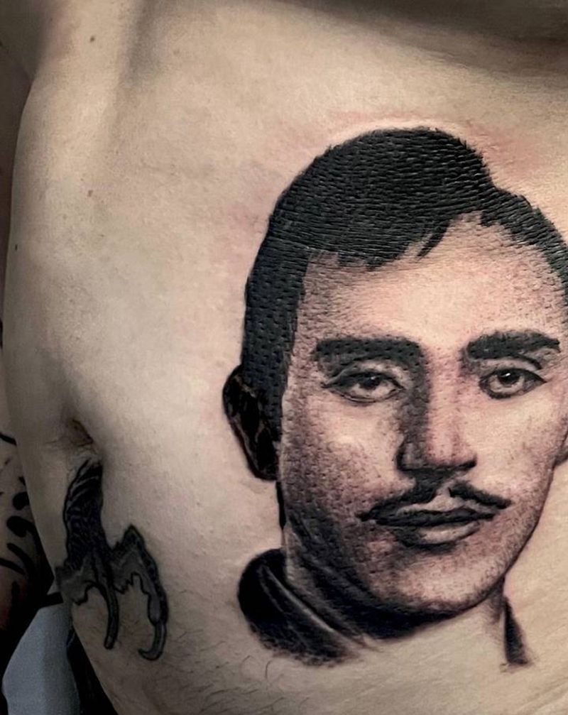 车臣之夫。杜达耶夫纹身图片_腹部欧美写实新传统纹身图案