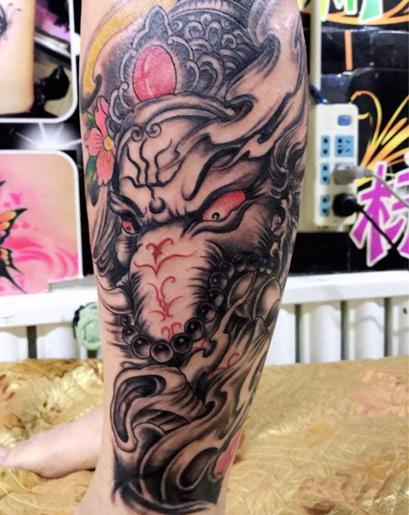 小腿象神纹身图片_腿部新传统纹身图案