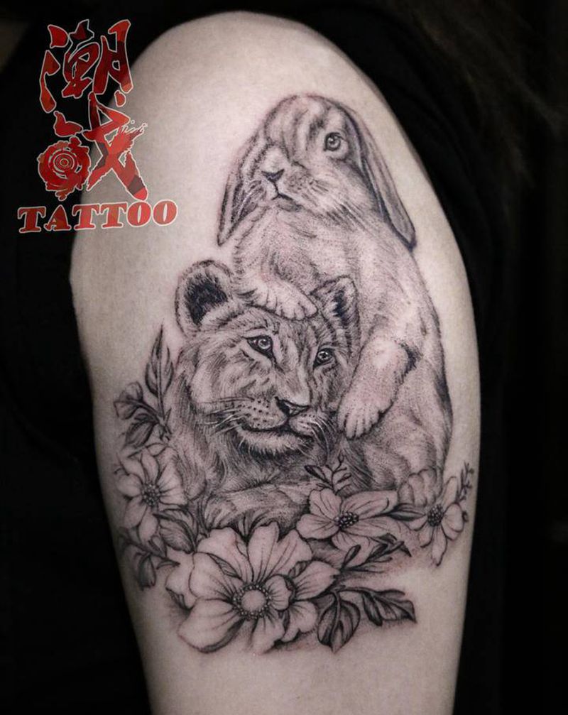 霸气兔兔纹身图片_手臂点刺欧美写实兔子狮子纹身图案