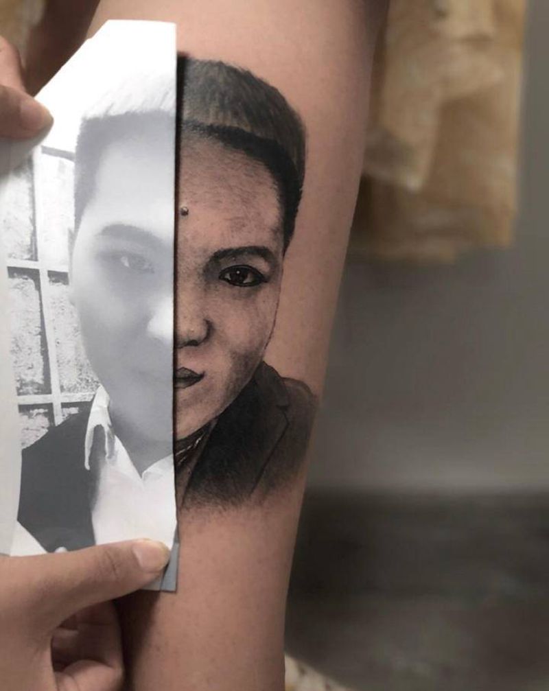 人物肖像纹身图片_腿部欧美写实纹身图案