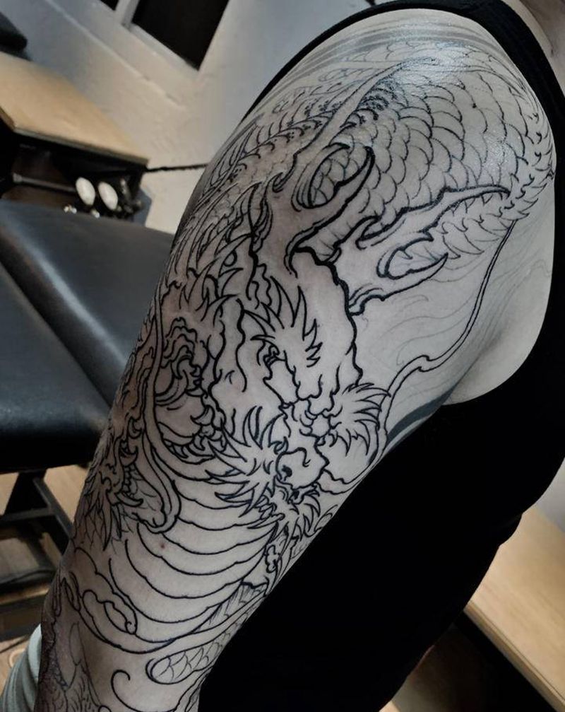 龙臂 未完成纹身图片_臀部手臂新传统纹身图案