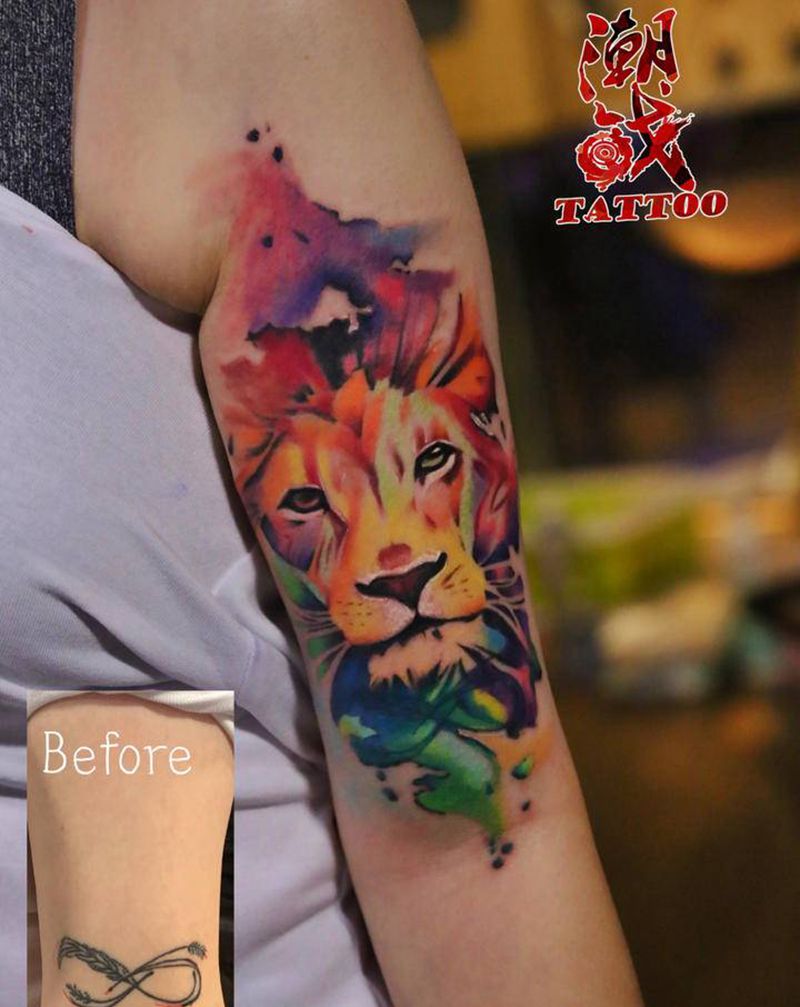 狮子王纹身图片_手臂水彩欧美写实遮盖狮子纹身图案