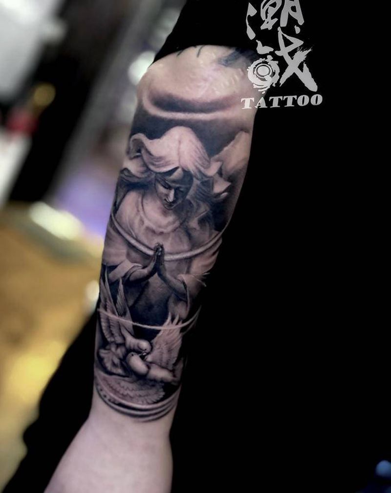 圣母玛利亚纹身图片_手臂欧美写实玛利亚纹身图案