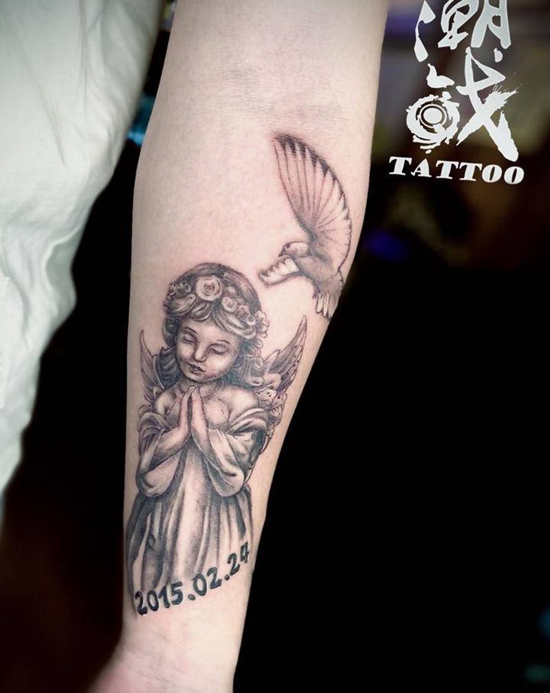 天使降临纹身图片_手臂欧美写实天使纹身图案