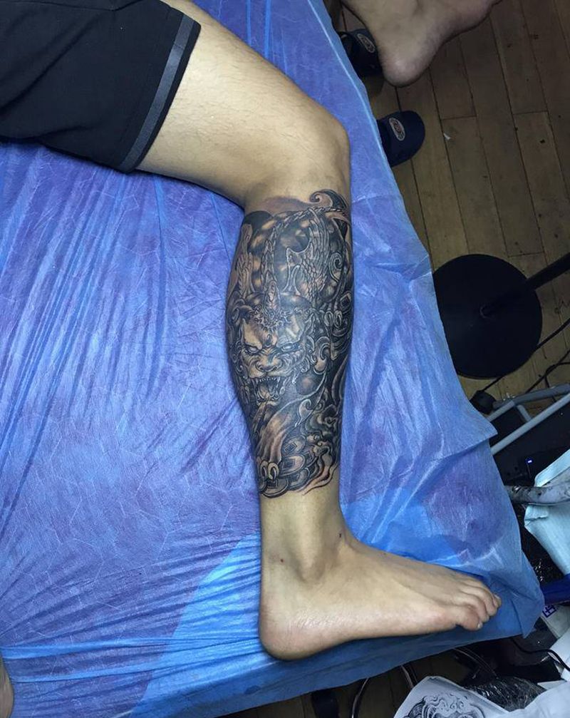 貔貅遮盖旧纹身纹身图片_腿部新传统纹身图案