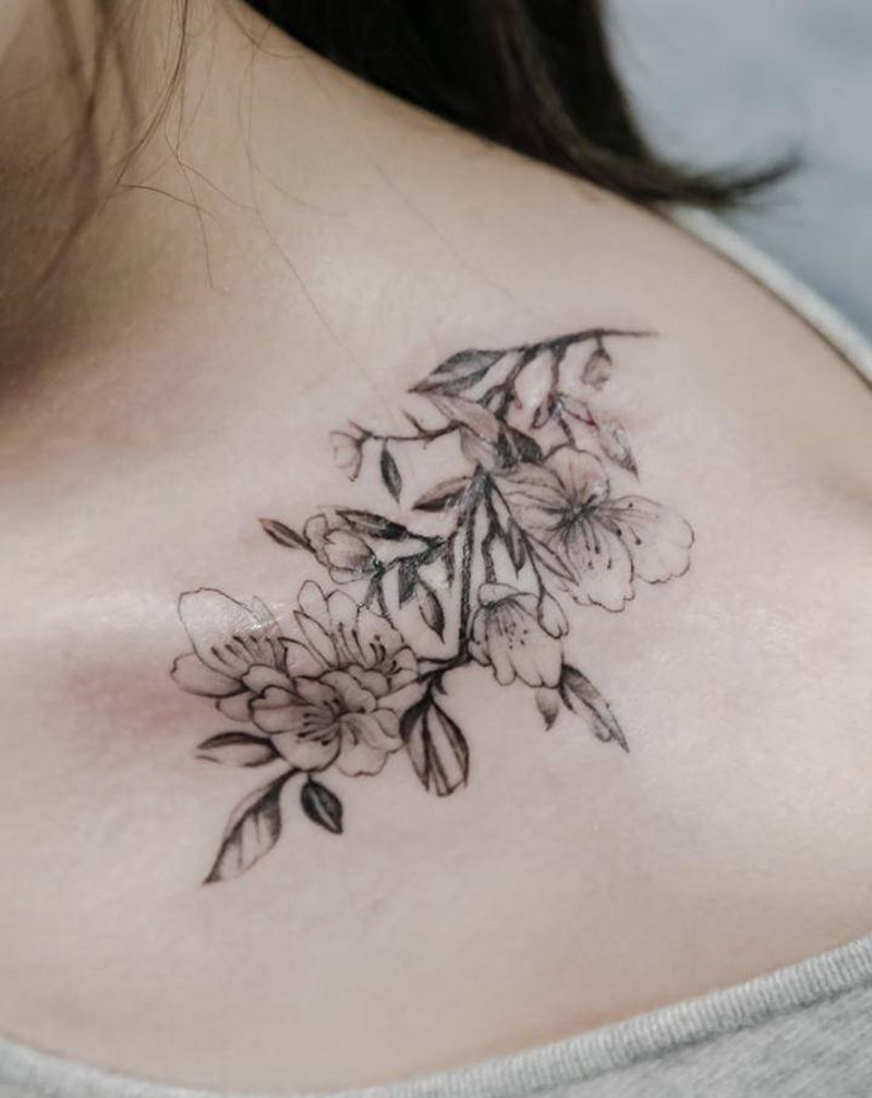 疤痕遮盖纹身图片_肩部欧美写实点刺花遮盖纹身图案