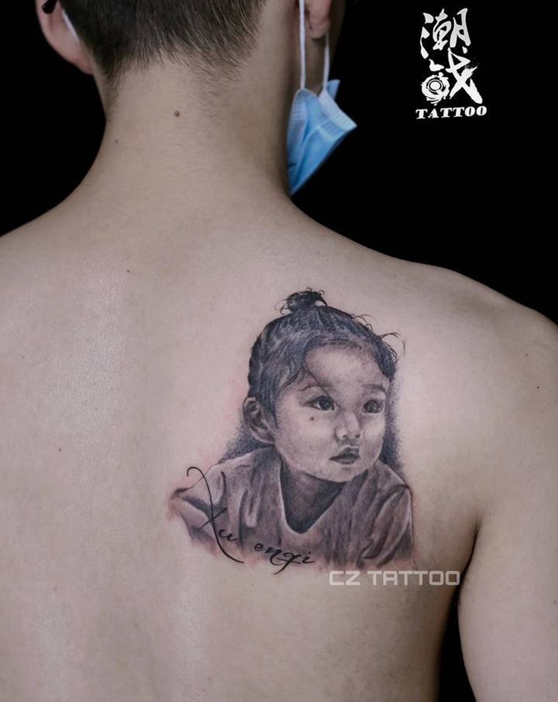 宝贝女儿纹身图片_背部欧美写实肖像纹身图案