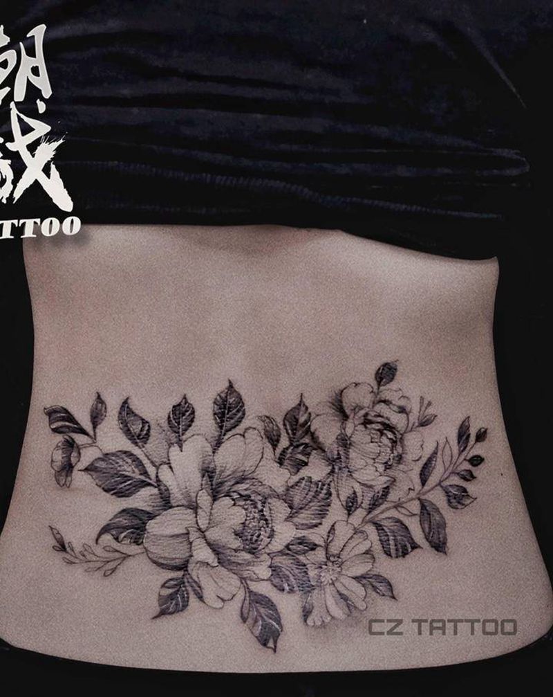 素花纹身图片_腰部欧美写实纹身图案