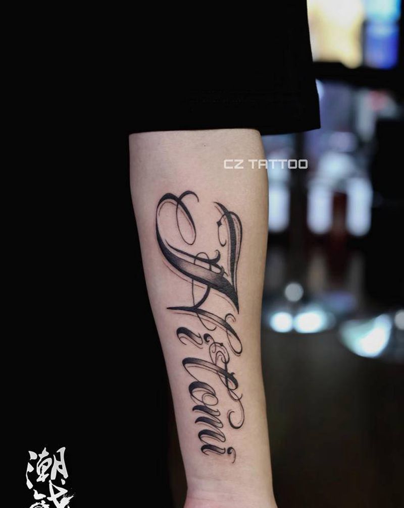 花体字纹身图片_手臂花体字纹身图案