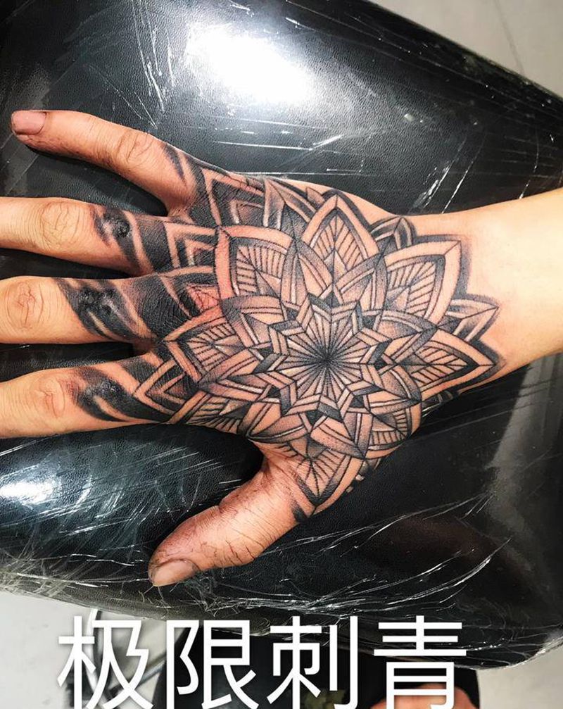 手背梵花纹身图片_手部纹身图案
