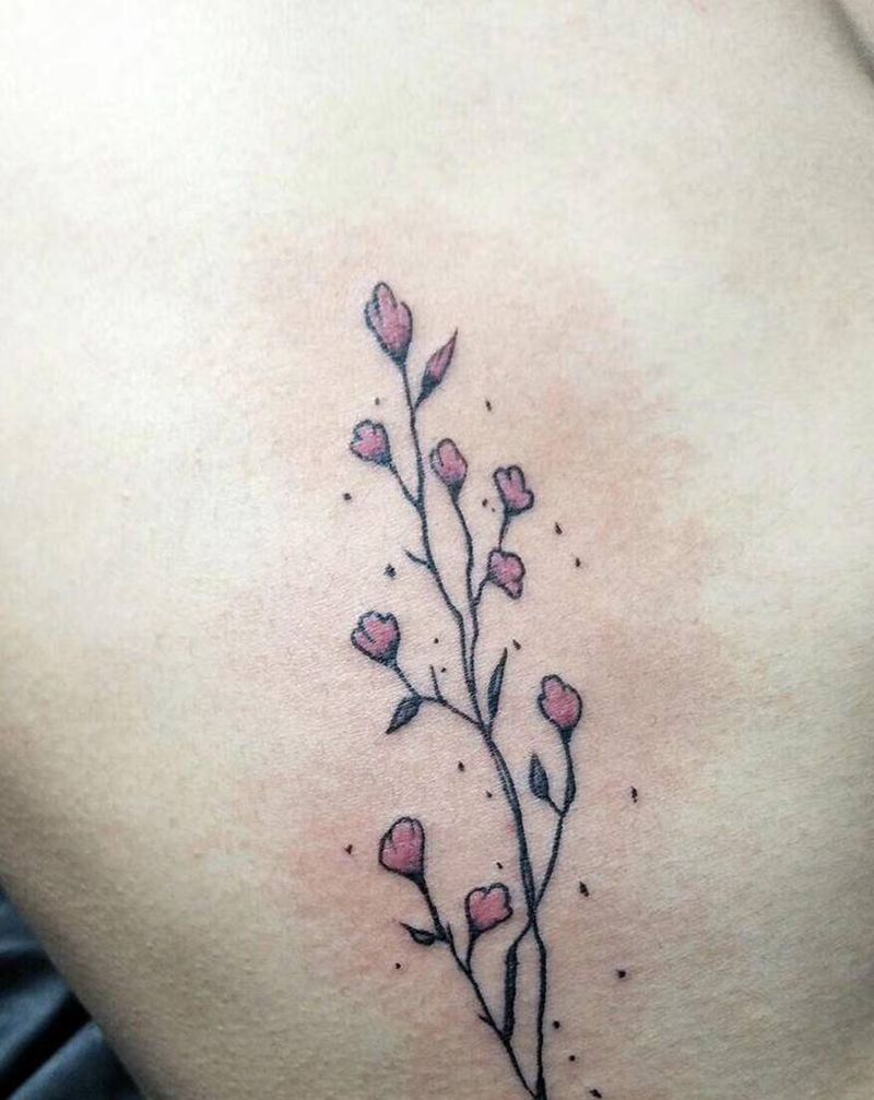 小花纹身图片_腰部纹身图案