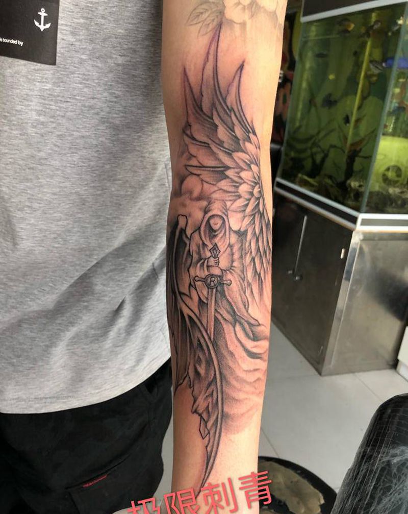 正义天使纹身图片_手臂欧美写实纹身图案