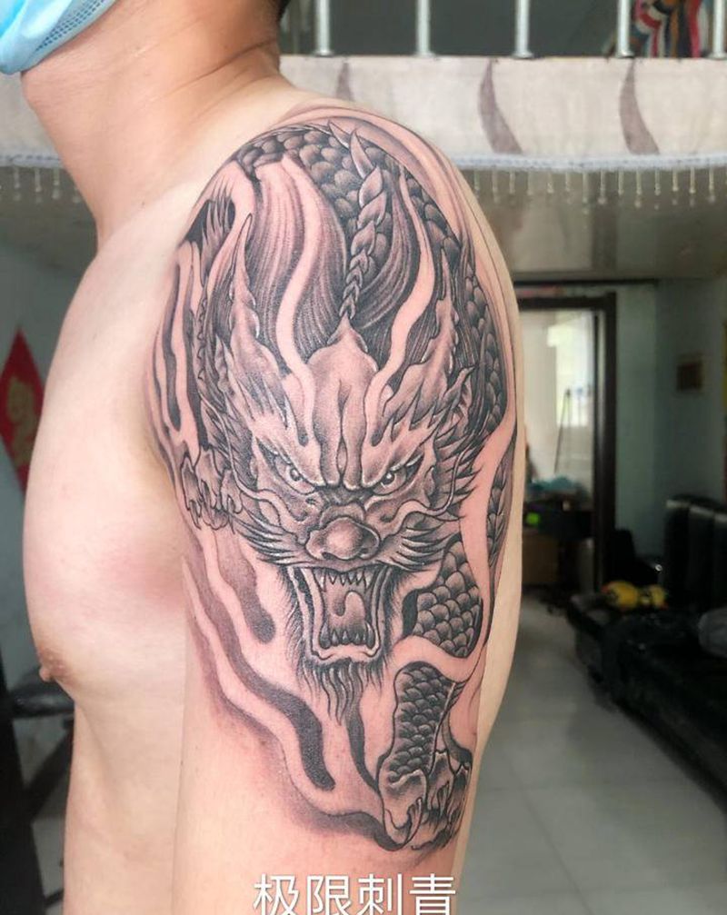麒麟纹身图片_手臂新传统纹身图案
