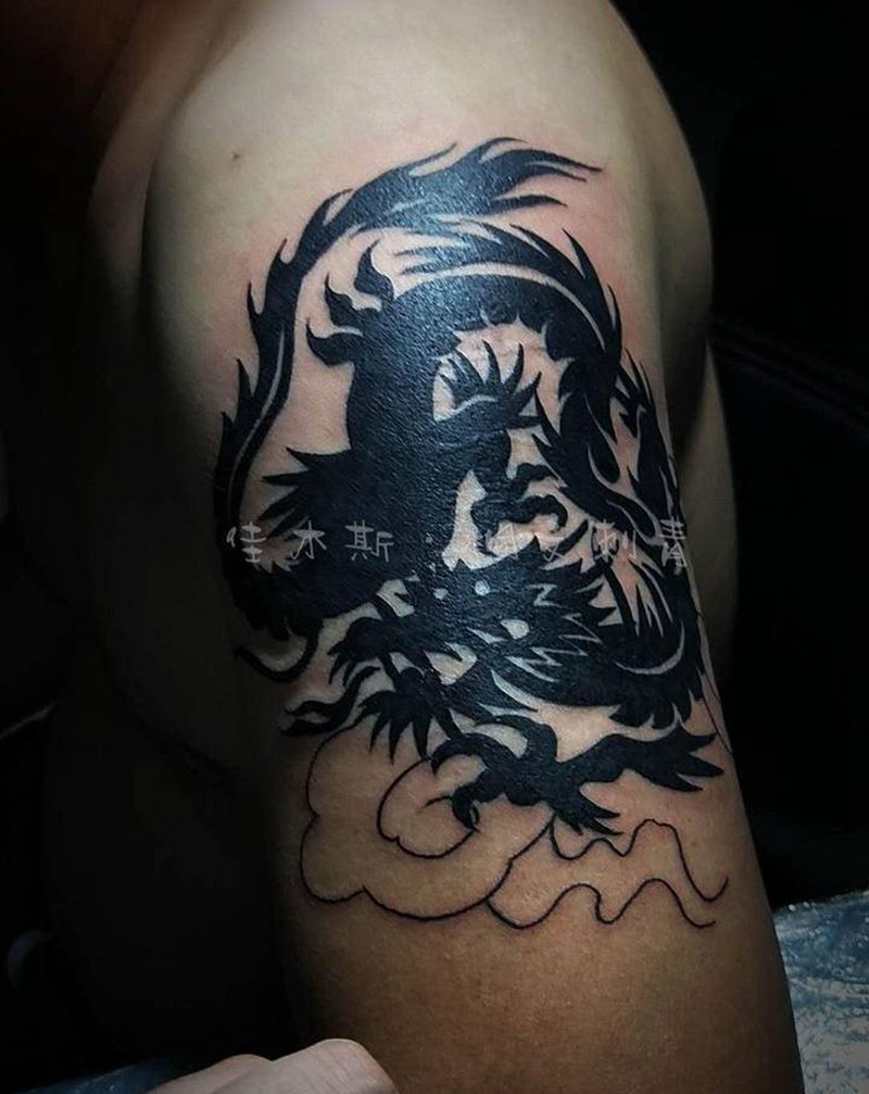 图腾龙纹身图片_手臂纹身图案