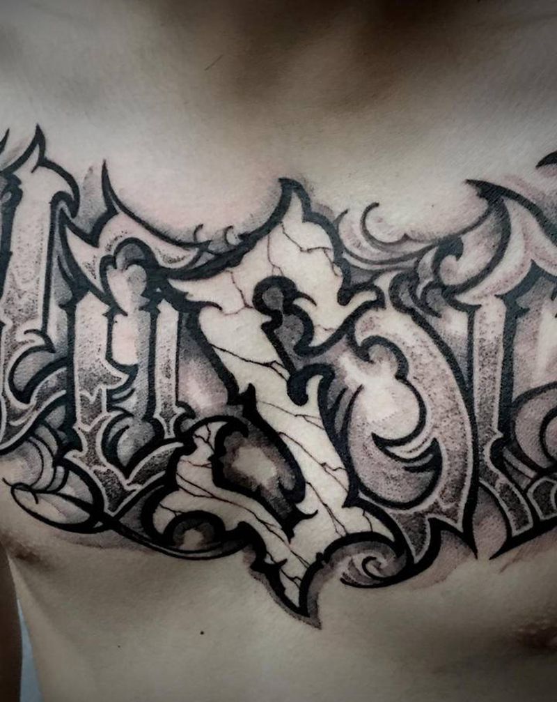 胸花纹身图片_背部花体字点刺纹身图案