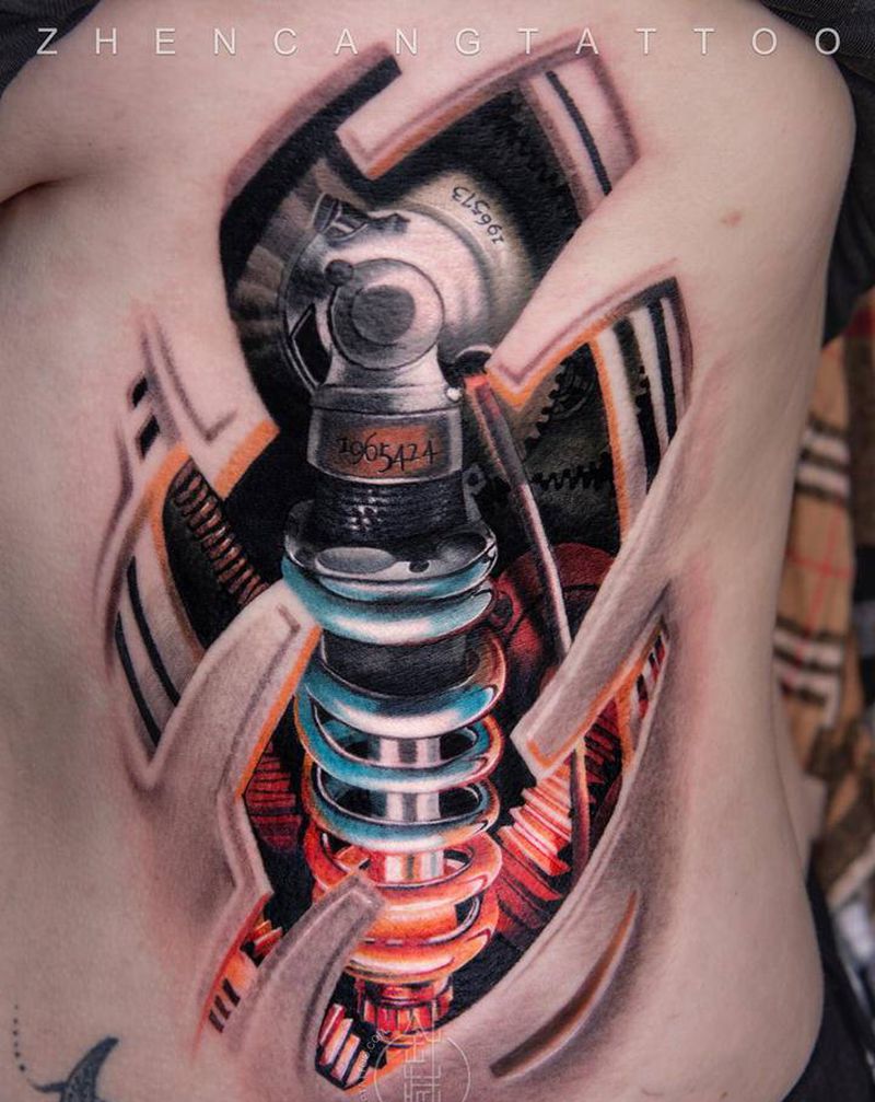 人体减震 针藏刺青 邵钢作品纹身图片_腰部欧美写实针藏刺青邵钢机械纹身图案