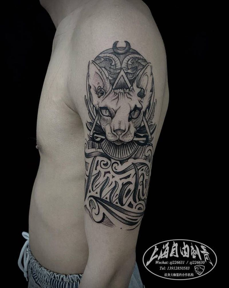 司芬克斯纹身图片_手臂欧美写实司芬克斯纹身图案