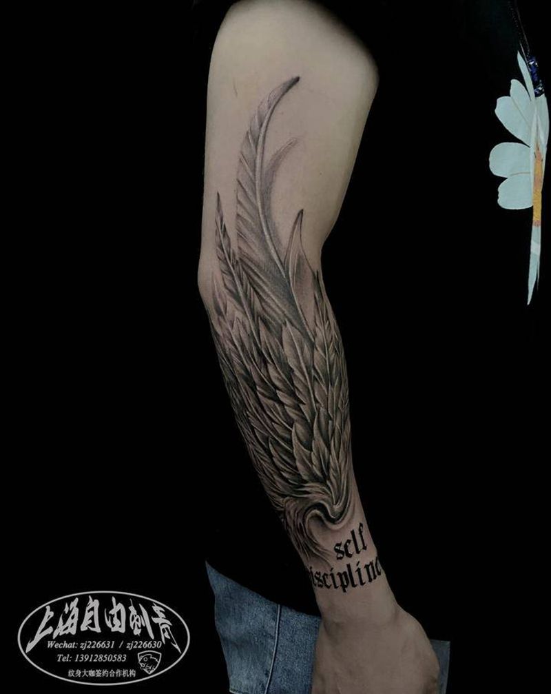 羽毛纹身图片_手臂欧美写实羽毛纹身图案