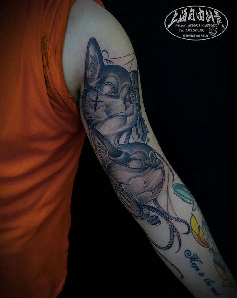 猫纹身图片_手臂欧美写实猫纹身图案