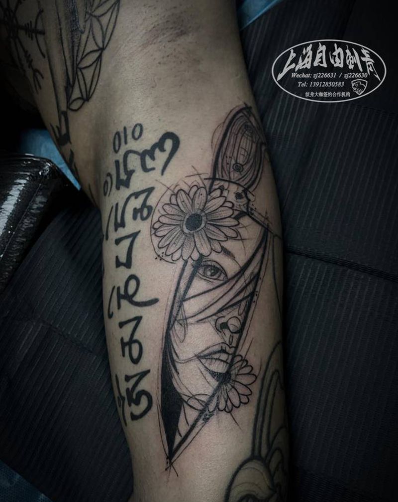 匕首纹身图片_手臂欧美写实几何匕首纹身图案