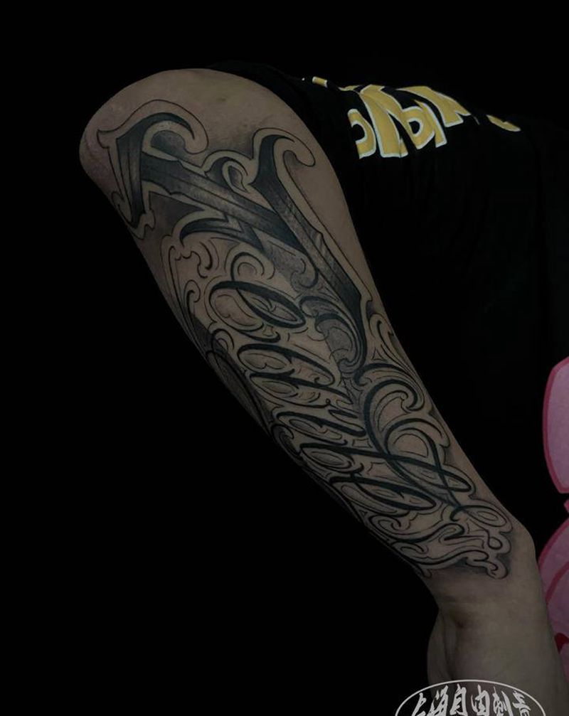 无畏纹身图片_手臂花体字无畏纹身图案