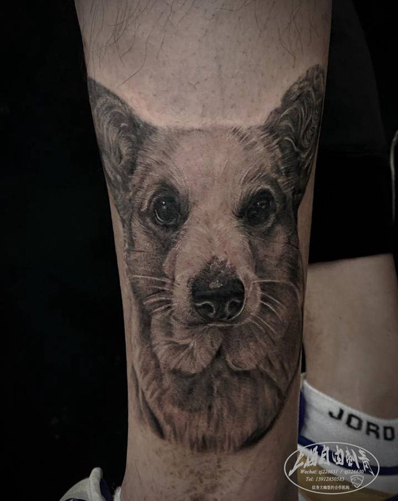 客人的狗纹身图片_腿部欧美写实狗纹身图案