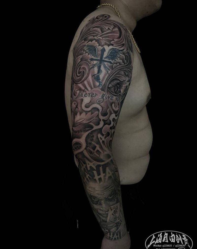 小丑   圣母玛利亚拼接花臂纹身图片_手臂欧美写实圣母小丑纹身图案