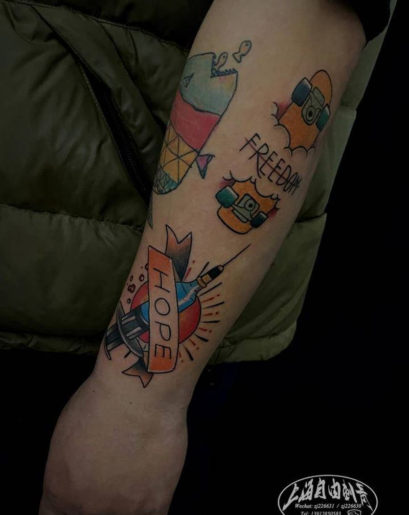 拼接花臂纹身图片_手臂New School针筒纹身图案